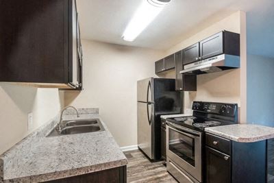 Kitchen with brand new appliances and cabinets